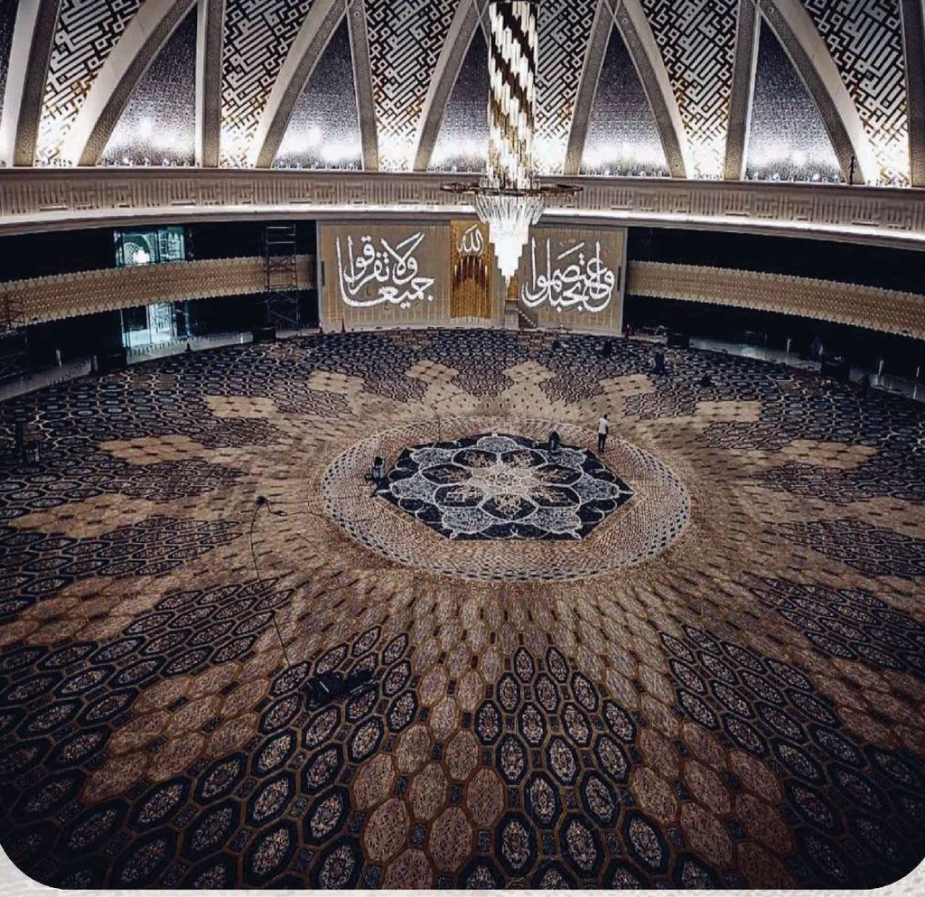 Main prayer hall of Sheikh Khalifa Bin Zayed Al Nahyan Mosque in Al Ain, with decorative acoustic panels and qibla wall treatments executed by Prestige Art Decoration Works