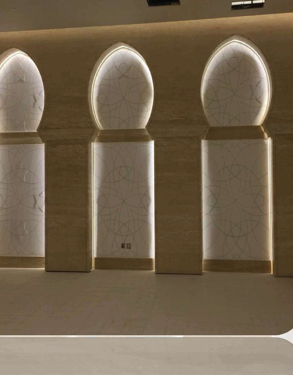 Backlit Islamic wall panels at the Sheikh Zayed Grand Mosque Center, Abu Dhabi